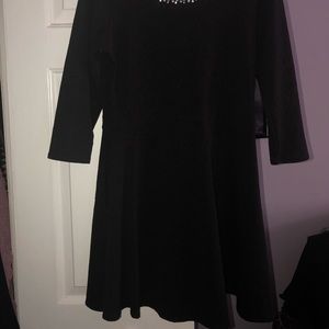 Black dress with pearls